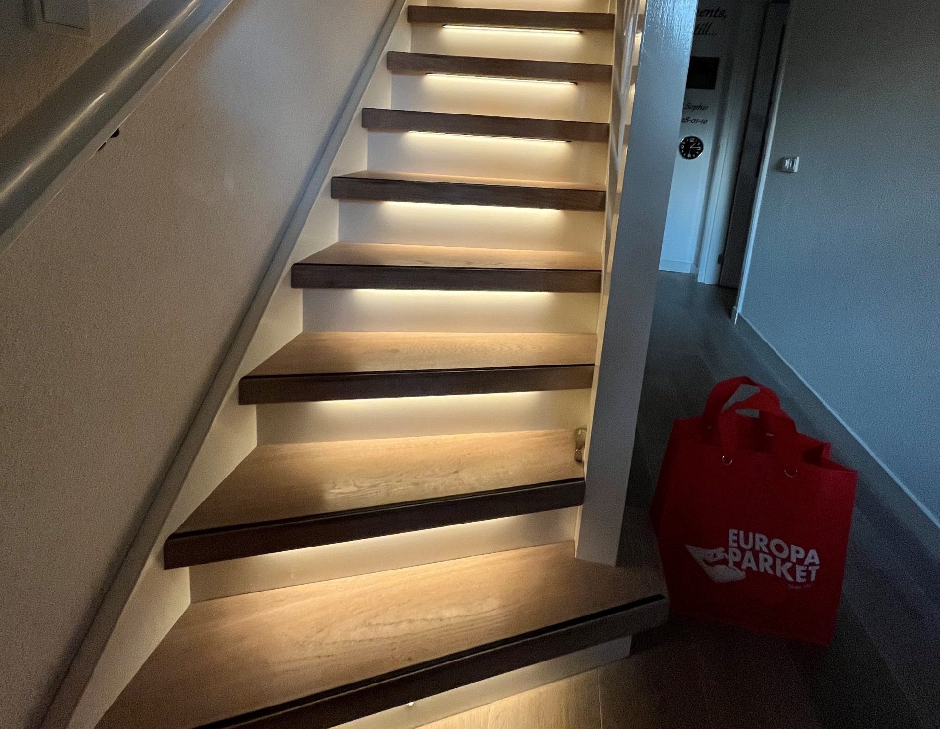 Houten traprenovatie met verlichting