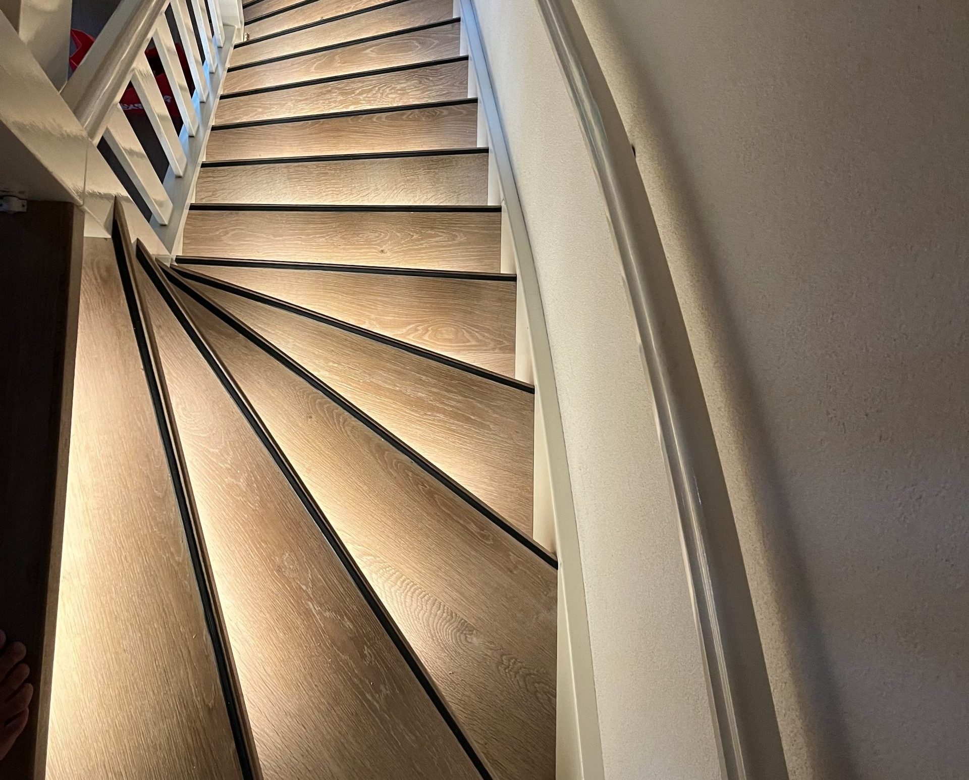 Houten traprenovatie met verlichting